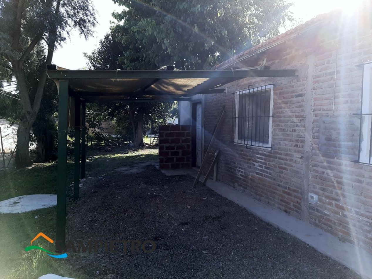 Local comercial esquina de la plaza principal, Villa Urquiza