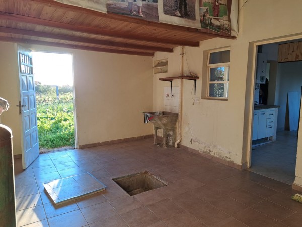 Casa 2 dormitorios, amplio garage y patio en Colonia Nueva Villa Urquiza